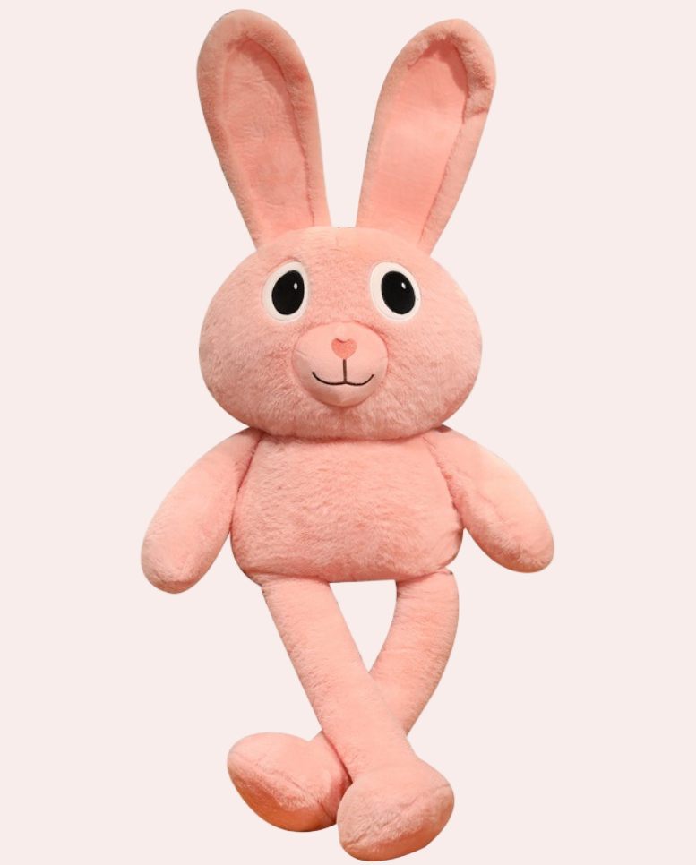 Pink plush toy rabbit on a white background
