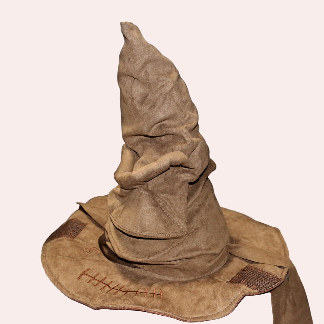 Brown pointed hat with a textured surface on a beige background
