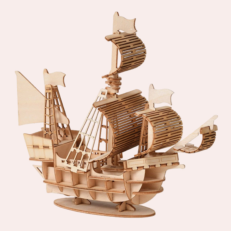 Wooden ship model kit on a white background